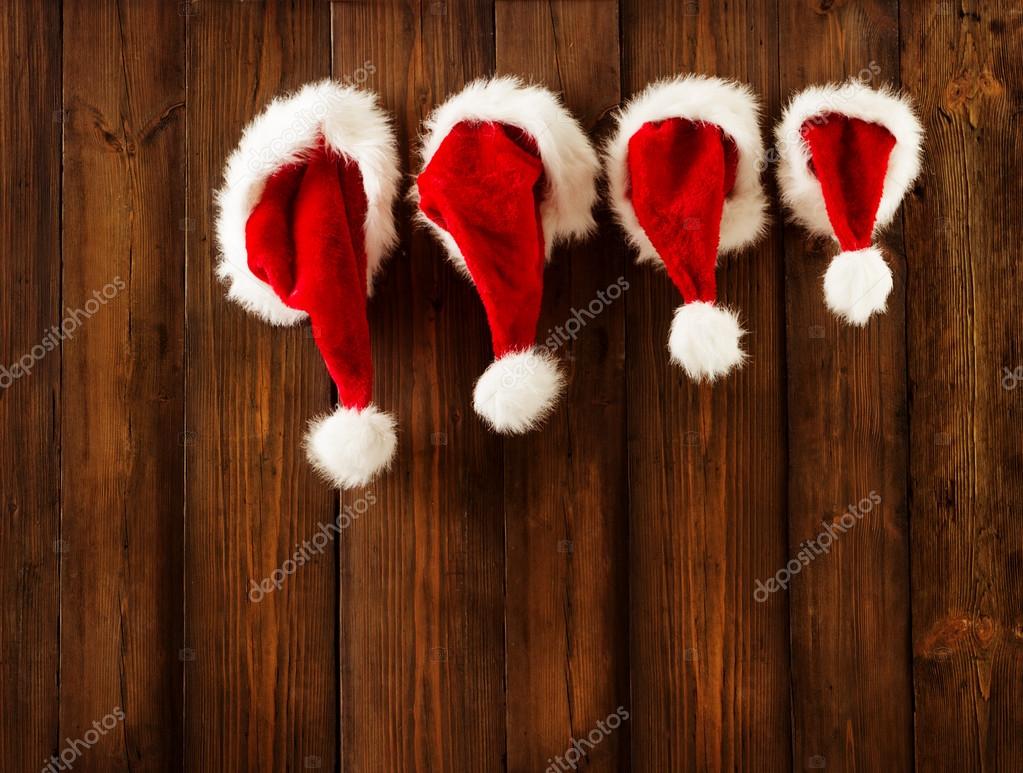 depositphotos_88069450-stock-photo-christmas-family-santa-claus-hats.jpg