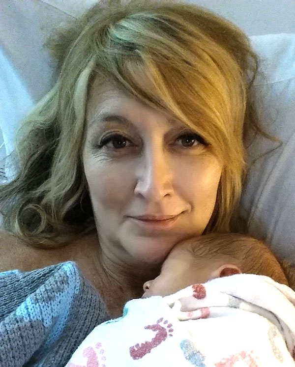 Wendy Burch holds her newborn son